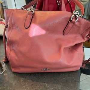 Coach salmon pink purse. Small stain inside on lining